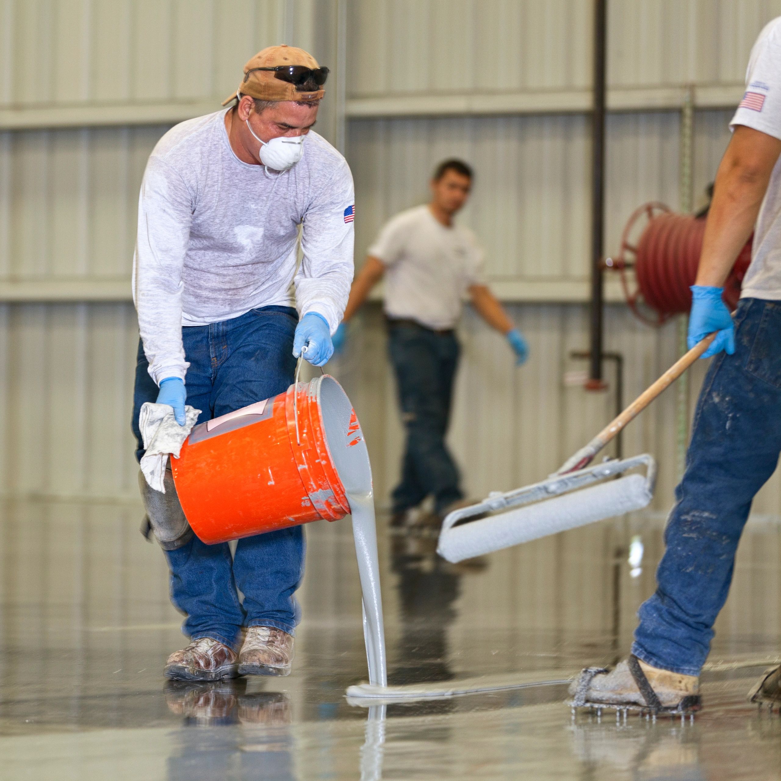 Epoxy flooring professionals at work